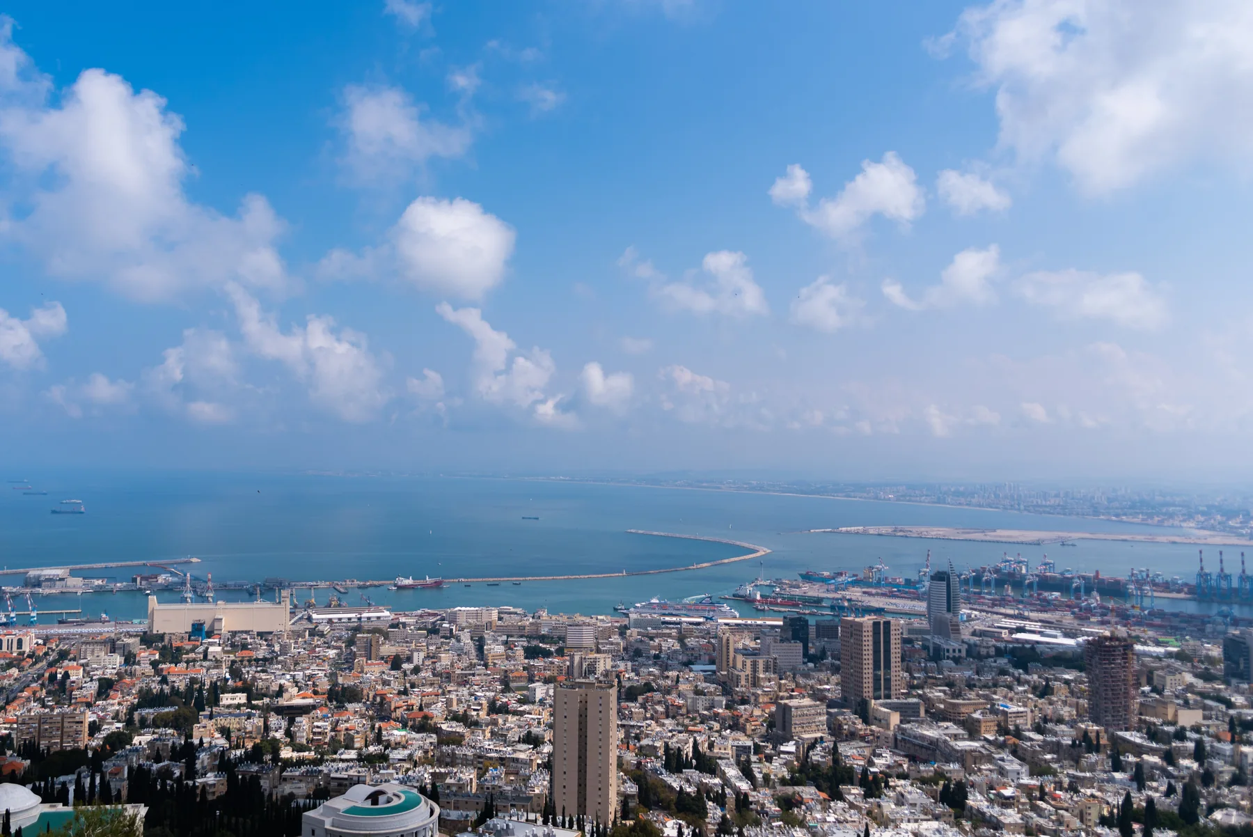 Haifa Bay and harbour panorama Panoramic view across Haifa city, the harbour and Haifa Bay beneath clouds